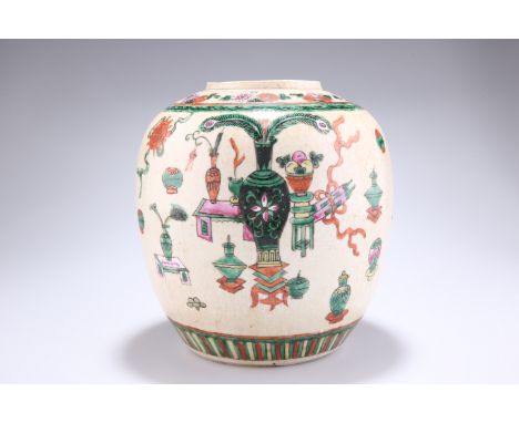 A CHINESE FAMILLE ROSE VASE, ovoid, enamel painted with objects. 21cm high