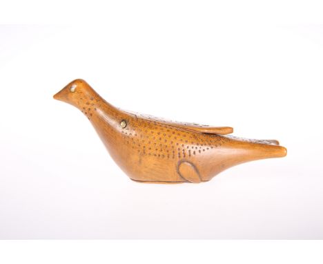 TREEN: A 19TH CENTURY NOVELTY SNUFF BOX, carved in the form of a bird. 13cm longThe absence of a Condition Report does not im