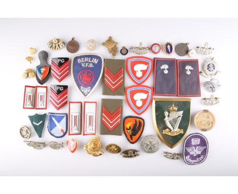 A COLLECTION OF POLICE BADGES AND PATCHES, ST JOHNS AMBULANCE BADGES AND ENAMEL BADGES. (Approx. 60)
