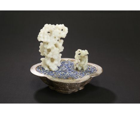 A CHINESE JADE, LAPIS AND WHITE-METAL JARDINIERE GROUP, the white-metal jardiniere of elongated quatrefoil form, the jade fig