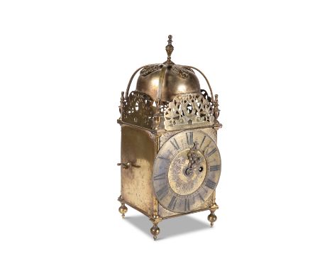 A LATE VICTORIAN BRASS SINGLE-FUSEE LANTERN CLOCK, with bell-top and pierced dolphin and foliate frets, foliate engraved dial