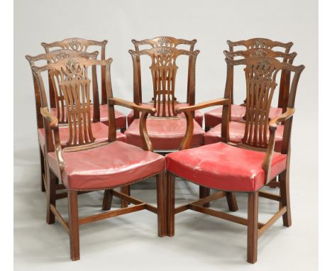 A SET OF EIGHT CHIPPENDALE STYLE MAHOGANY DINING CHAIRS, CIRCA 1900, including a pair of carvers, each with yoked crest rail 