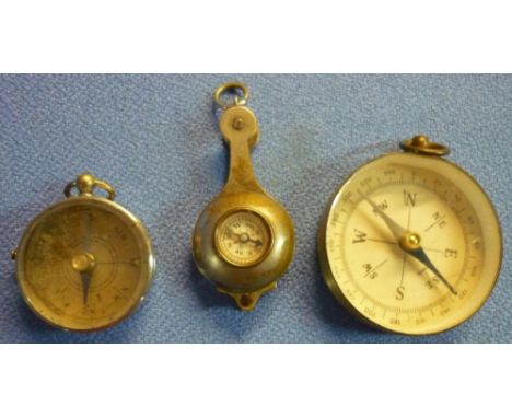 Small silver plated fob compass and magnifier, and two other fob compasses (3) 