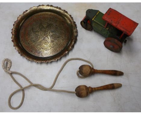 Eastern brass tray, vintage skipping rope and a tin-plate clockwork road roller 