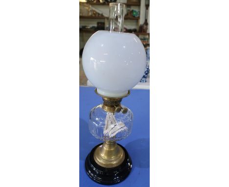 19th/20th C oil lamp with turned base, clear glass reservoir and opaque glass shade, complete with chimney (57cm high) 