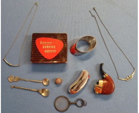 Indian white metal spoon, various white metal brooches, eye loop, cigarette lighter, Ronson service outfit tin and Ronson lig