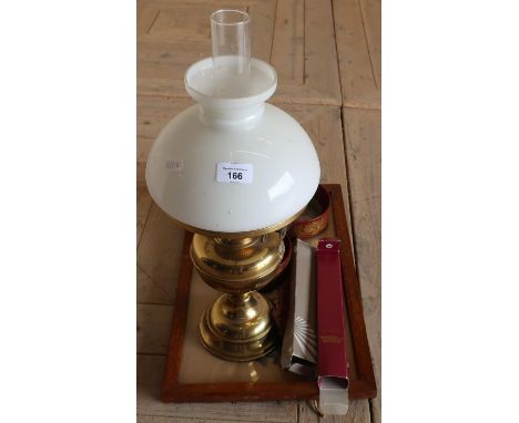 Modern brass oil lamp, coasters, embroidered oak framed tray, fans etc 