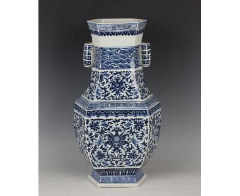 A Chinese blue and white porcelain vase, mark of Qianlong but 20th century or later, of hexagonal hu form, painted with bands