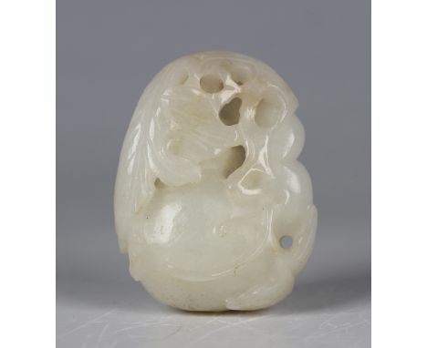 A Chinese white jade pendant, 20th century, carved and pierced as two gourds enveloped in its leaves and tendrils, length 4.6