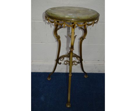 A LATE 19TH CENTURY CIRCULAR ONYX TOPPED OCCASIONAL TABLE, on a foliate brass tripod base united by a raised stretcher, appro