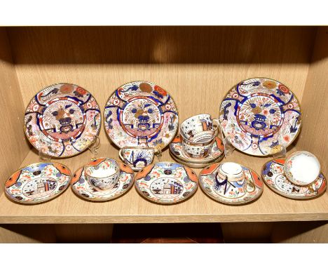 A SET OF SIX EARLY 19TH CENTURY SPODE TEA CUPS AND SEVEN MATCHING SAUCERS, decorated in the Imari palette with an arched roof