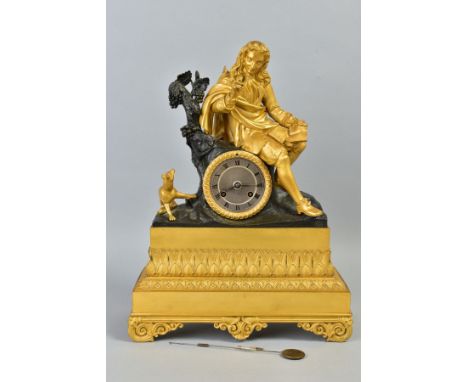 A 19TH CENTURY ORMOLU AND PATINATED MANTEL CLOCK, the case surmounted by a gentleman writer in long wig leaning on a tree stu