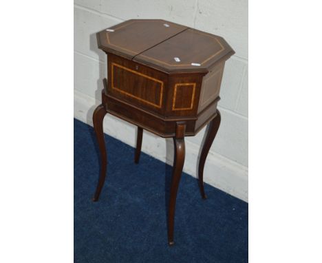 AN EDWARDIAN MAHOGANY AND STRUNG SEWING BOX, rectangular form with canted corners, double fold over top enclosing a removable