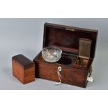 AN EARLY VICTORIAN ROSEWOOD TEA CADDY, of sarcophagus form, gilt metal lion mask and ring side