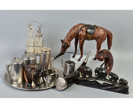 AN EPNS AND PRESSED GLASS FOUR BOTTLE CRUET SET, with an Old Hall hammered stainless steel tea service, an EPNS chocolate pot