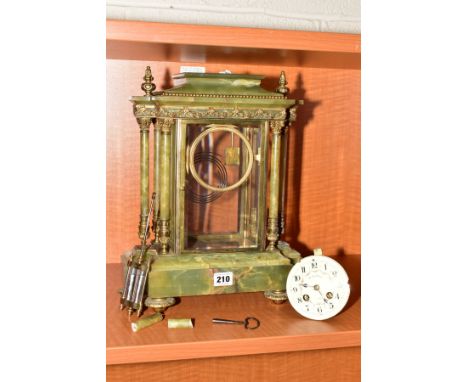 A LATE 19TH CENTURY ONYX MANTEL CLOCK IN NEED OF RESTORATION, the breakfront architectural case with gilt metal mounts, three