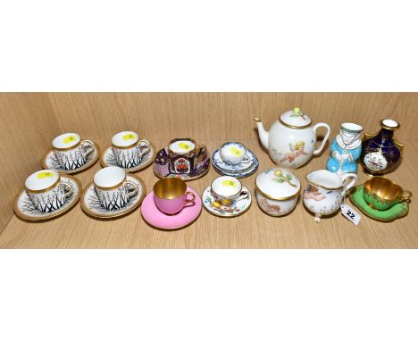 A COLLECTION OF ROYAL WORCESTER COFFEE CANS AND SAUCERS, MINIATURE ITEMS, ETC, including a three piece teaset decorated with 