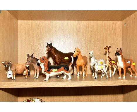 A GROUP OF BESWICK AND ROYAL DOULTON ANIMALS, some damaged pieces, comprising Royal Doulton Boxer 'Ch. Warlord of Mazelaine' 