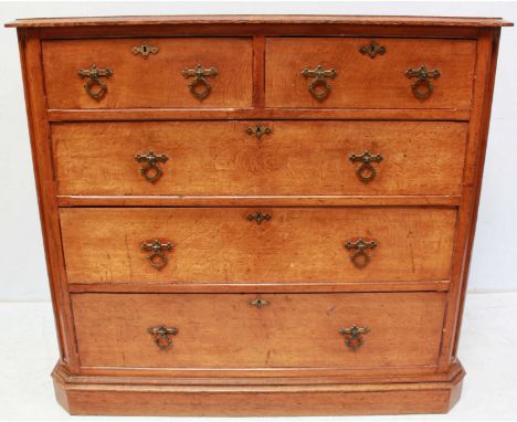 A Victorian Irish light oak chest of drawers by Fry & Co of Dublin, comprising two short and three long graduated drawers wit