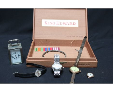 A small cased miniature carriage clock, together with a 9ct gold ladies watch and 3 other watches.