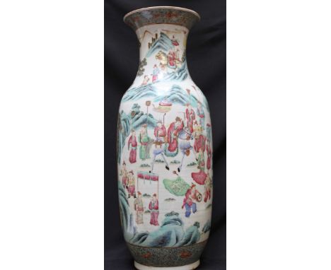 A large late 19th /early 20th century Chinese porcelain vase of baluster form, painted in Canton enamel colours with vignette