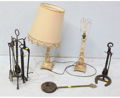 A pair of onyx table lamps, together with two sets of fire tools and a roasting pan. (5)