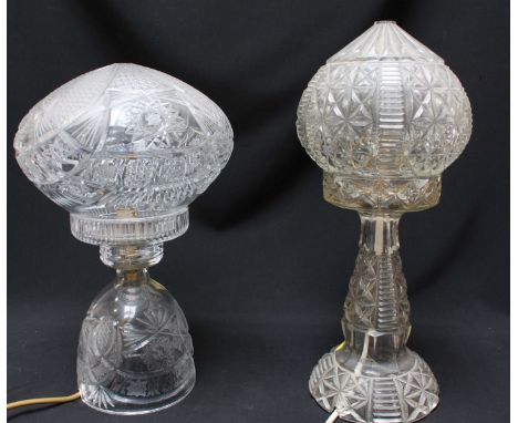 A cut-glass table lamp with compressed globular shade, 35cm high, together with a similar press-moulded glass table lamp