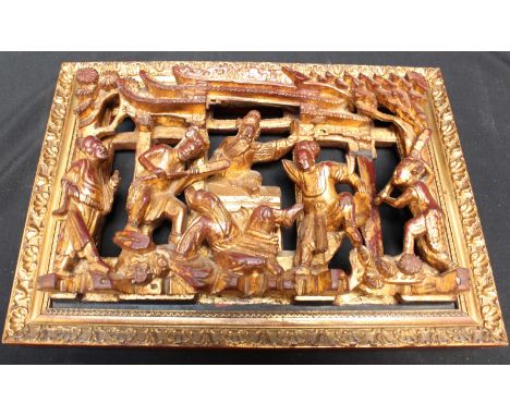 A Chinese carved hardwood and gilded open panel, decorated with a temple scene of figures. 25.5 cm wide.