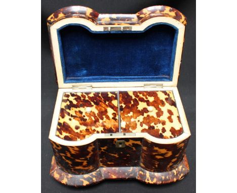 A 19th century tortoise shell two division tea caddy, with pagoda top enclosing two caddies with tortoise shell covers, inver