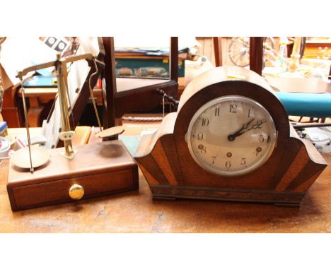 A set of brass and mahogany postal scales by Webb of London, together with an oak cased mantle clock. (2)