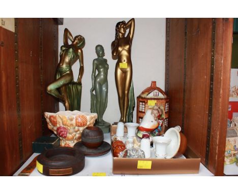 SECTION 21. A shelf of assorted items including three large Art Deco style painted plaster ladies, assorted ceramics, a lette