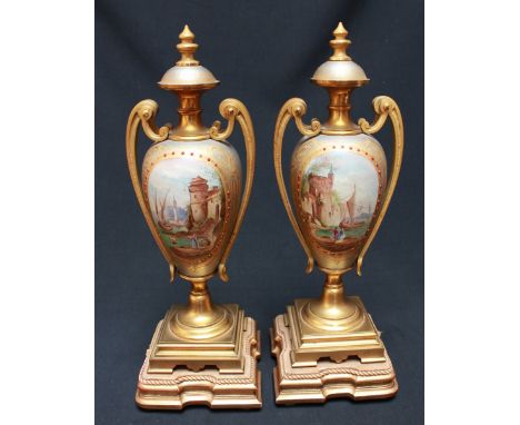 A fine quality pair of 19th century French ormolu mounted porcelain vases on stands. The bodies painted with oval scenes of C