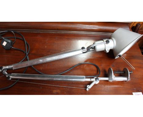 An anglepoise 'style' lamp by 'Artemide', with adjustable screw bracket for table mounting.