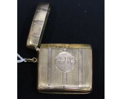 A 9ct gold engine turned vesta case, hallmarked Birmingham 1915. 24 grams.