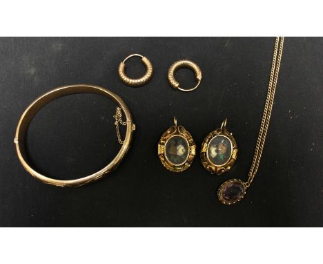 A 9ct gold hollow stiff bangle, together with a pair of 9ct gold earrings, a 9ct gold amethyst pendant on chain, and a pair o