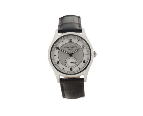 PATEK PHILIPPE, Geneve, Ref. 5565, movement no. 4409447, case No: 3559513, stainless steel wristwatch with a steel patek phil