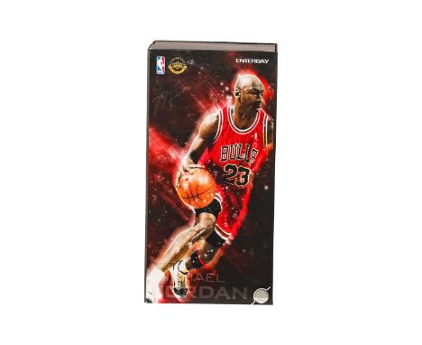 An Enterbay Michael Jordan 1:6 scale collectible figure, in original box, appears complete but likely previously displayed.So