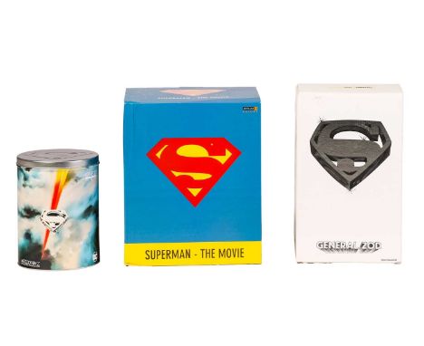 A Mezco Toyzs DC Superman 1978 edition figure, together with a Mattel General Zod figure, and an Iron Studios Superman - The 