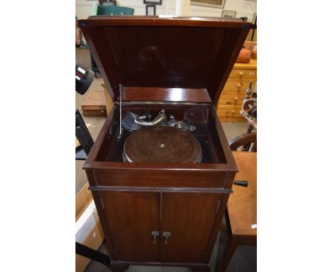 Wind up record player in cabinet