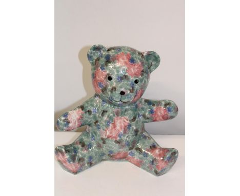 A large ceramic teddy bear. Height 28cm 