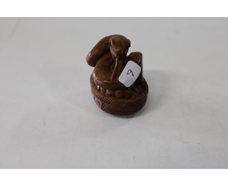 A Chinese box wood netsuke 