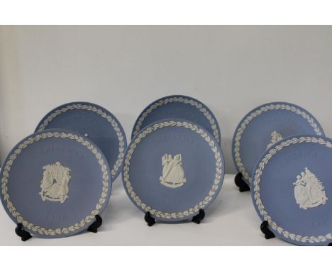 A selection of Wedgewood Jasperware Xmas plates (1994-1999) boxed 