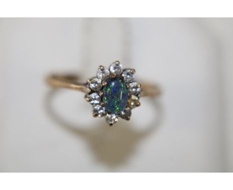 A 9ct gold opal &amp; white stone ring size S