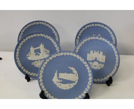 A selection of Wedgewood Jasperware Xmas plates (1975 - 1979) boxed 