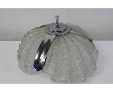 A large Art Deco period sea shell shaped ceiling light