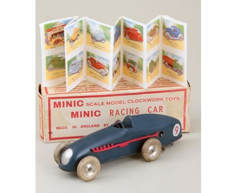 A Triang 'Minic' prewar clockwork racing car, with blue tin plate coach work, open cockpit and red plastic exhaust, fitted wh