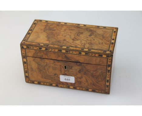 A Victorian figured walnut and specimen wood herringbone strung tea canister, of rectangular form, with twin lidded caddy int