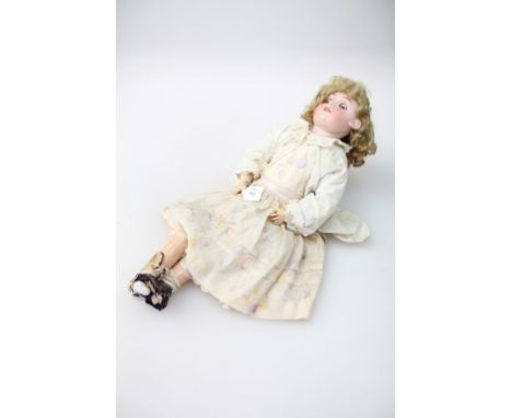 A Bisque headed German girl doll, by Max Handwerck, with sleeping eyes and open mouth, on composition and wood double jointed