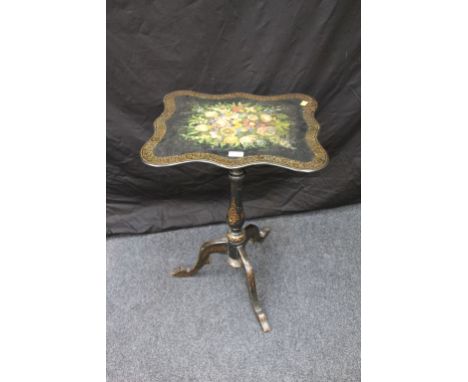 An early Victorian Welsh painted slate topped tripod table, the cartouche top painted with cut blooms, raised on a slender ba