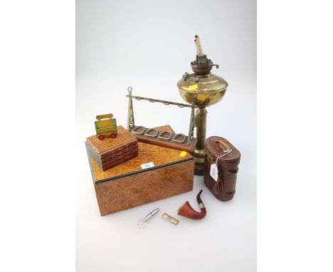 A simulated burr wood veneered humidor, together with a pipe rack, silver cigar cutter, pair of World War 1 field glasses in 